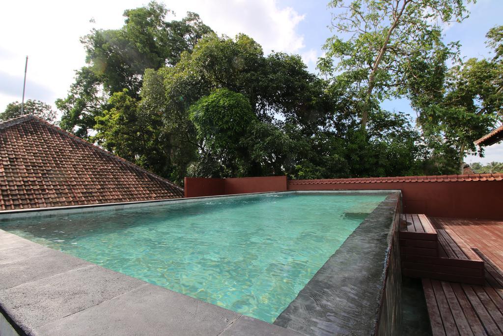 Petit Hotel Bali Убуд Экстерьер фото